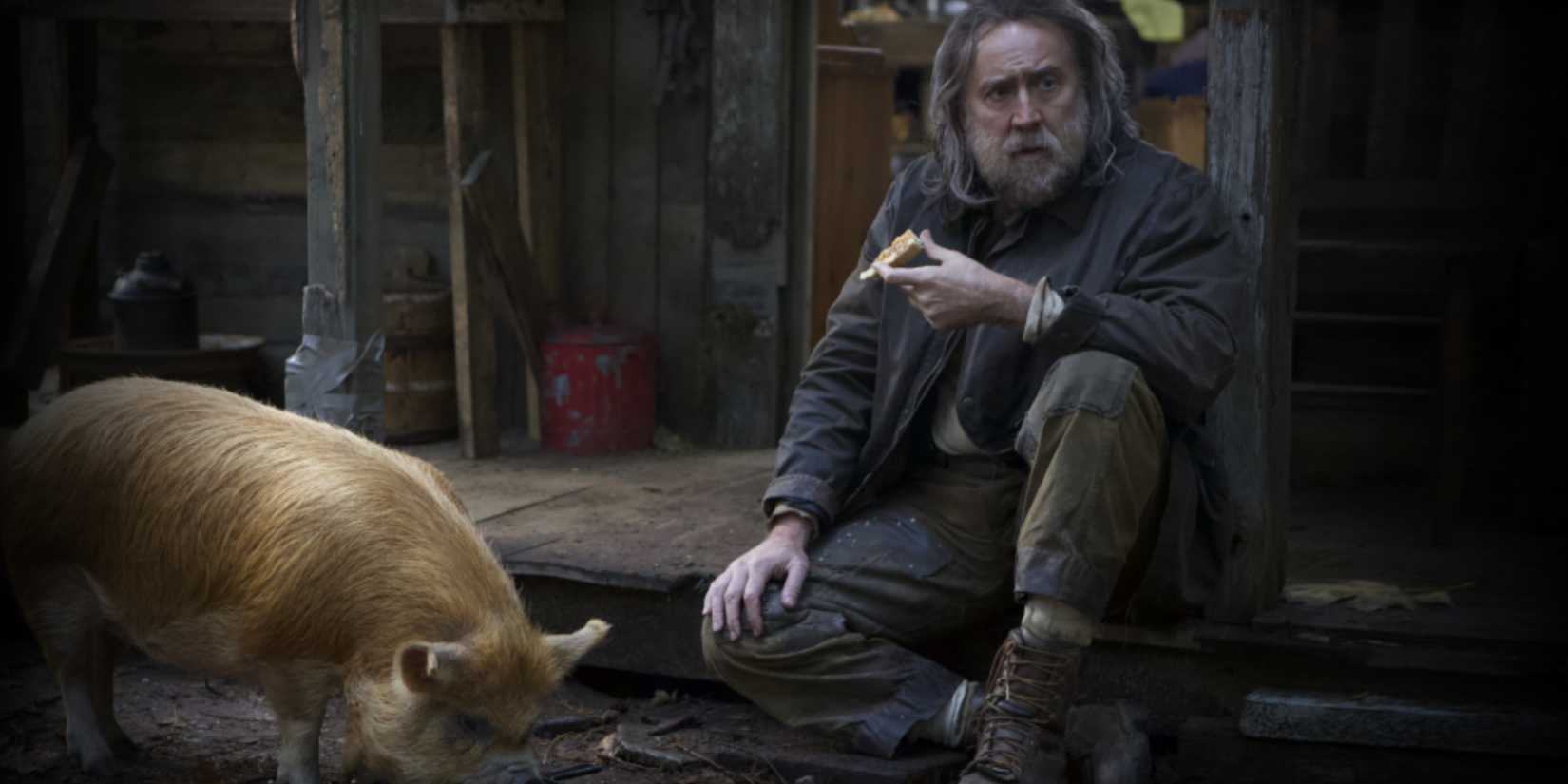 Nicolas Cage on a porch next to a blond pig