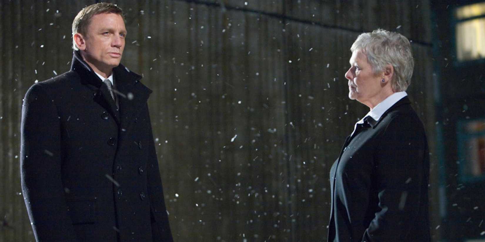 James Bond talks to M in as snow falls in Quantum of Solace.