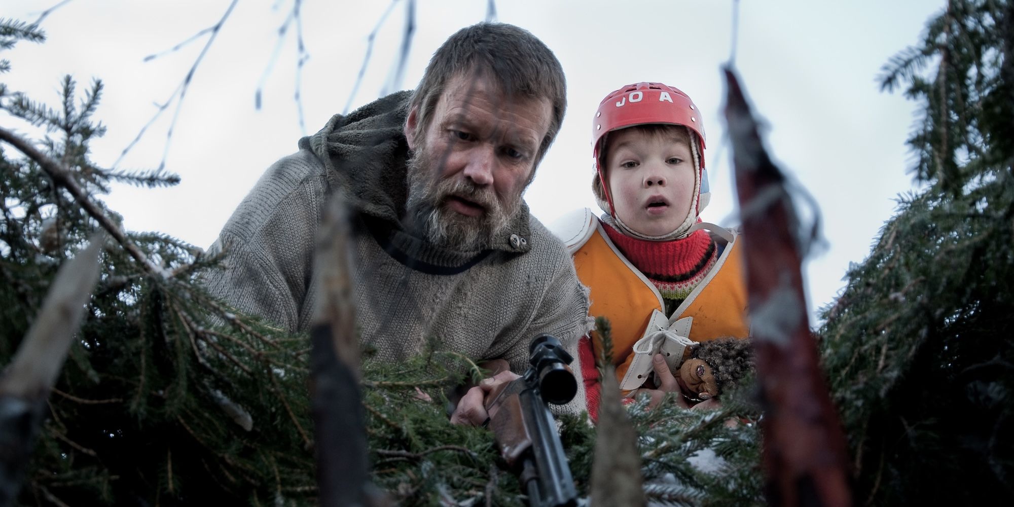 Jorma Tommila as Rauno and Onni Tommila as Pietari in Rare Exports: A Christmas Tale