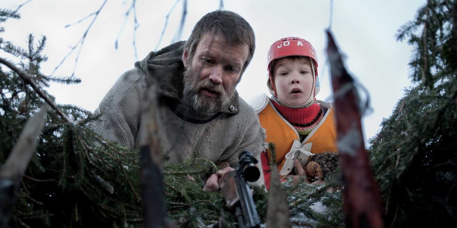 Jorma Tommila as Rauno and Onni Tommila as Pietari in Rare Exports: A Christmas Tale