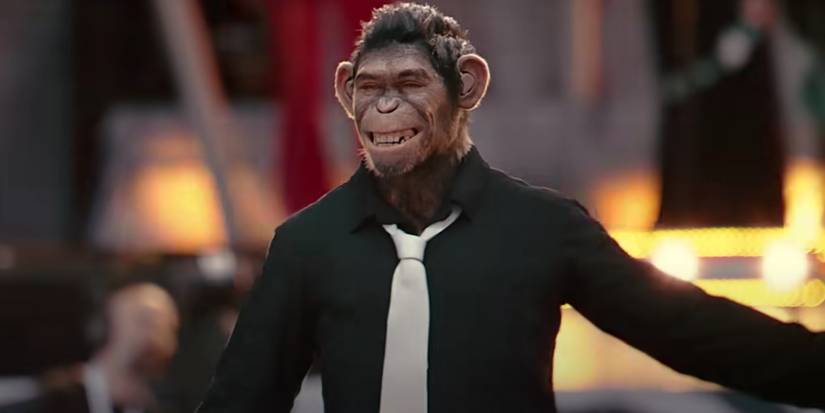 Robbie Williams smiling at the crowd as a chimpanzee in Better Man.