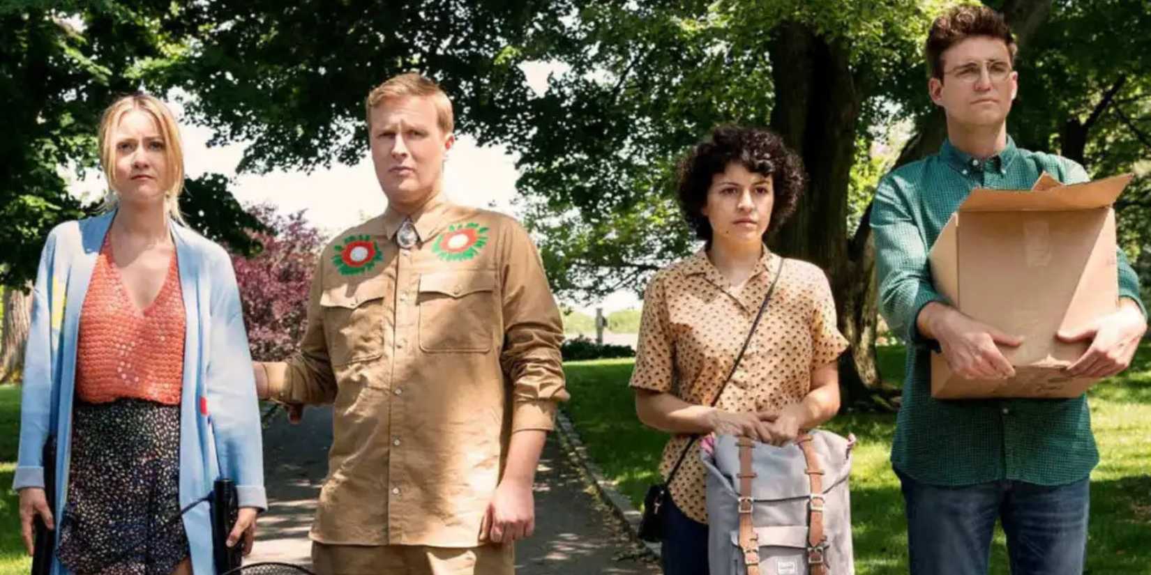 Cast of Search Party standing outside