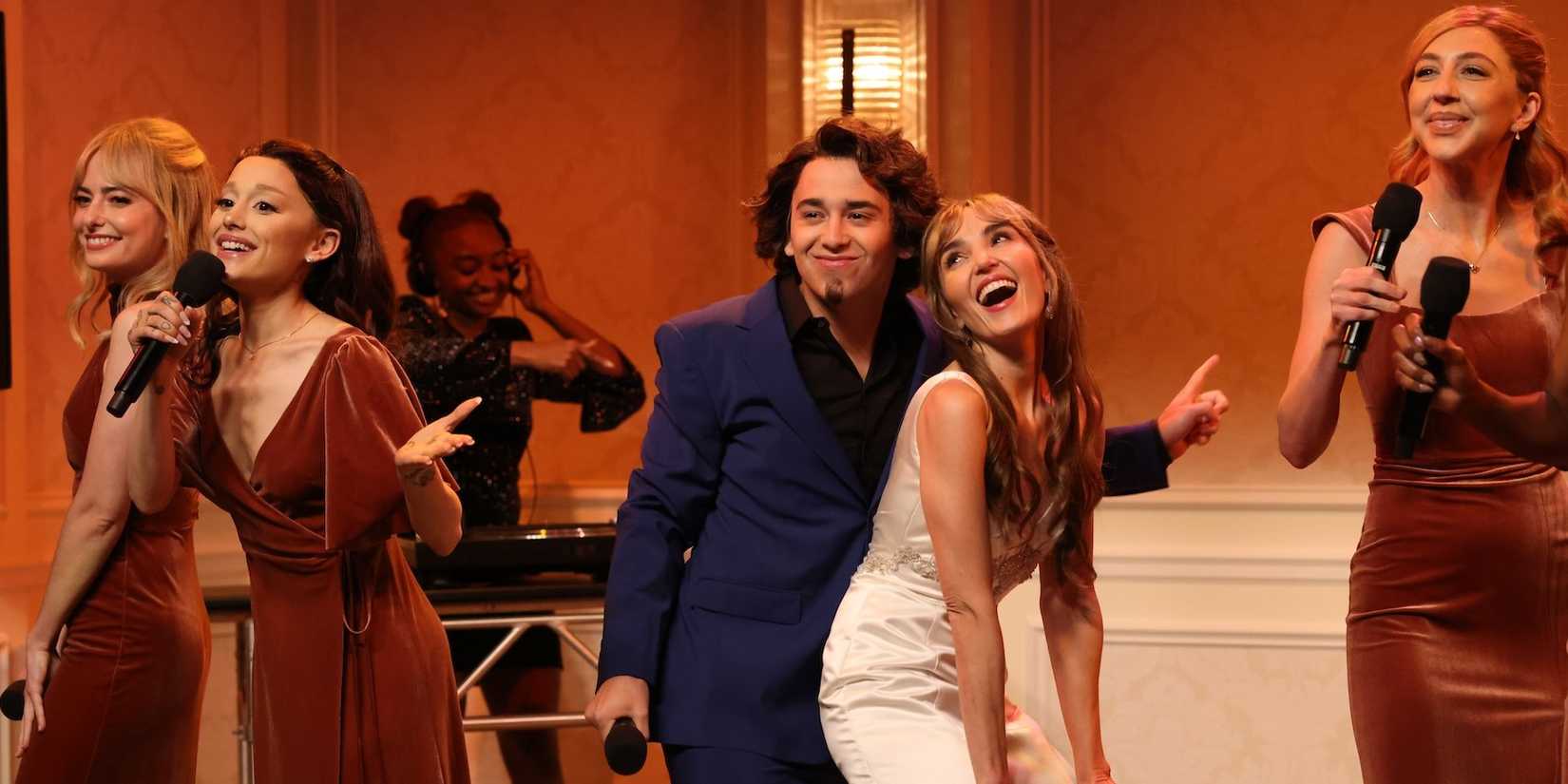 Ariana Grande, Heidi Gardner, and Chloe Fineman dancing with Marcello Hernandez on Saturday Night Live.