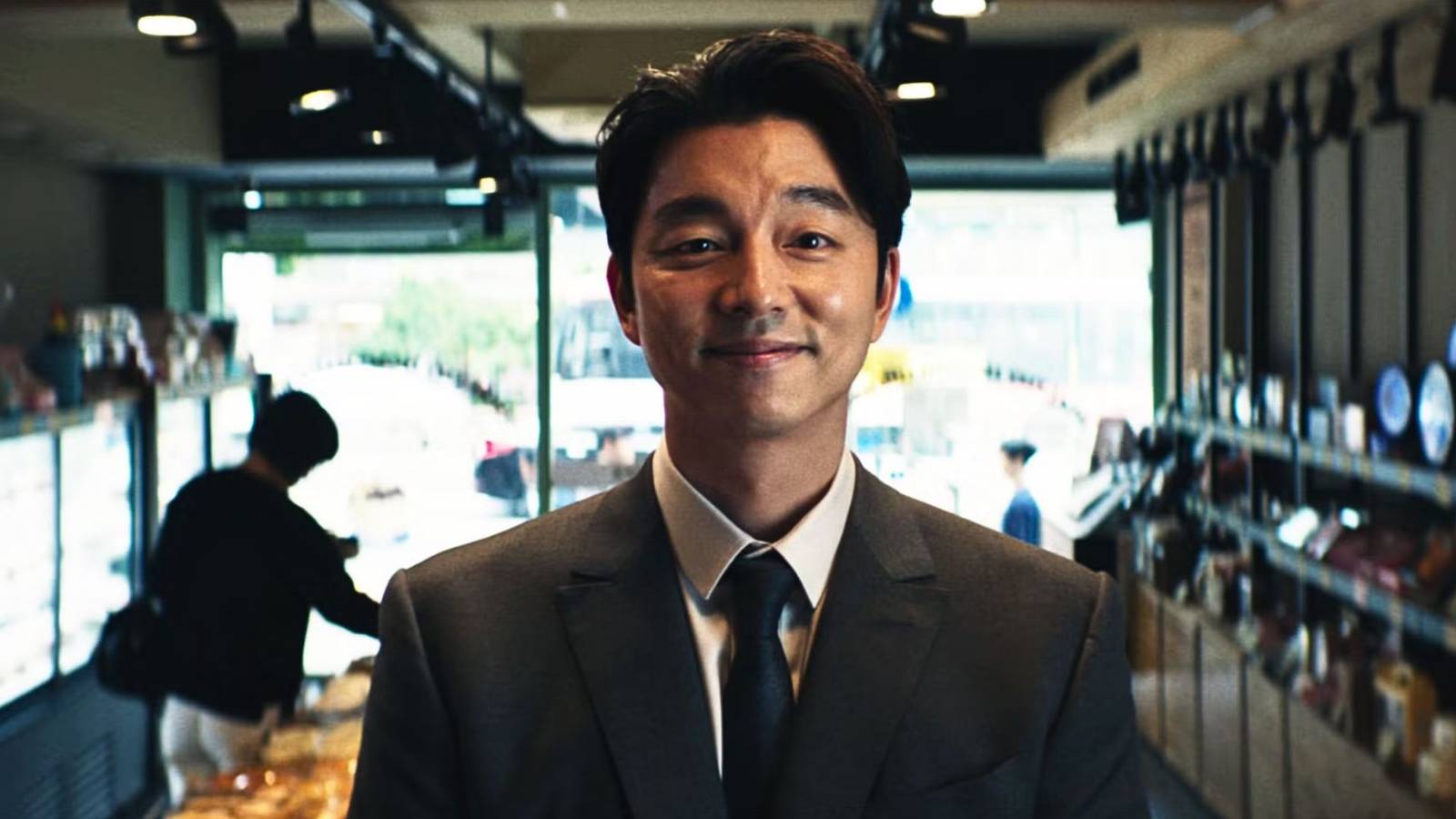 Gong Yoo as the Salesman buying bread in Squid Game Season 2.