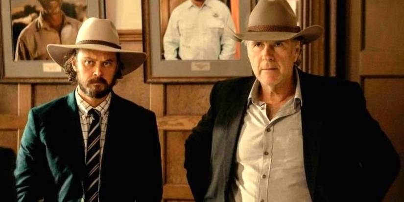 Graham (Michael Dorman) and Colin Lawson (Robert Taylor) stand together in 'Territory'.