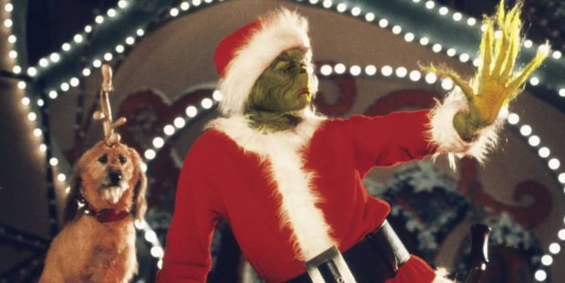 The Grinch and Max in Whoville in 'How the Grinch Stole Christmas'