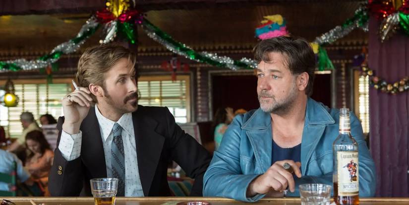 Holland and Russell Jackson sit at a bar in The Nice Guys.