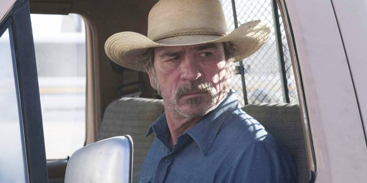 Tommy Lee Jones as Pete Perkins looks out his truck window in 'The Three Burials of Melquiades Estrada'