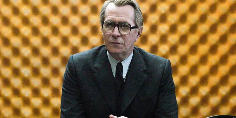 Smiley (Oldman) sitting at the head of the Circus's office in Tinker Tailor Soldier Spy