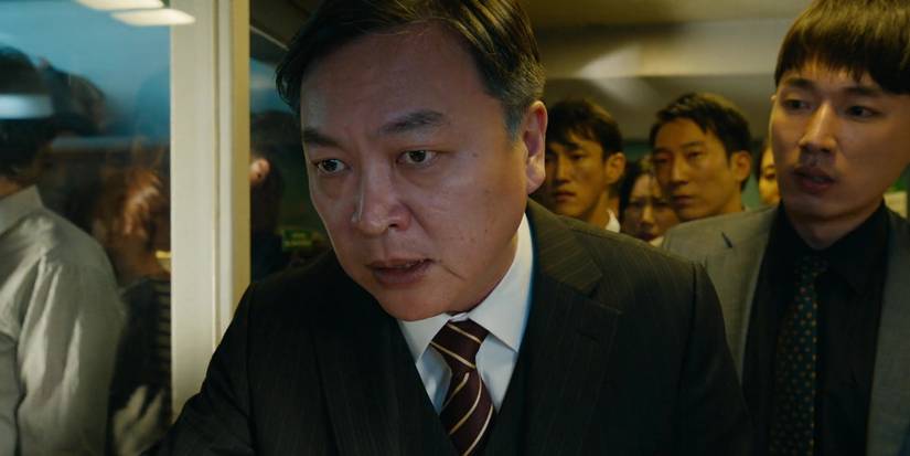 Yon-suk looking intently in Train to Busan