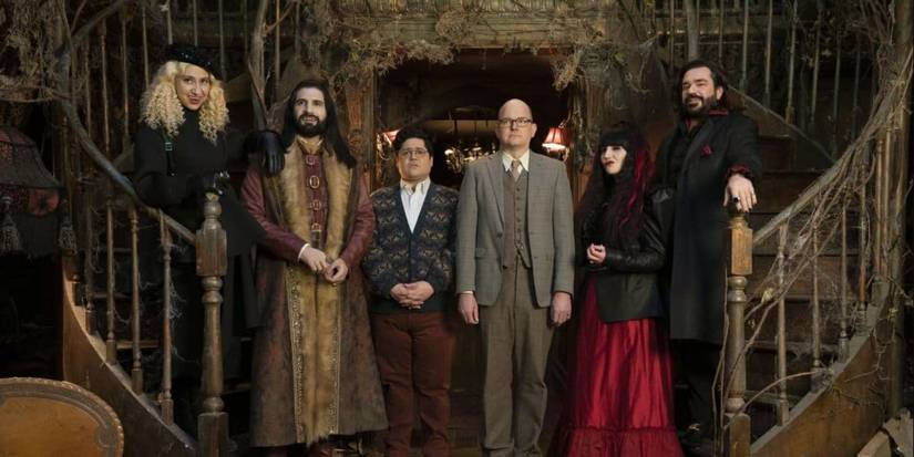 The cast of 'What We Do in the Shadows' posing for a portrait.