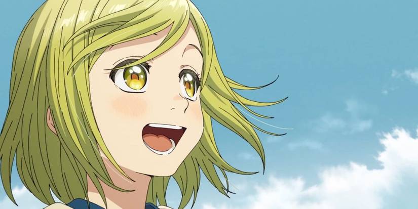 Coco from Witch Hat Atelier smiling widely.