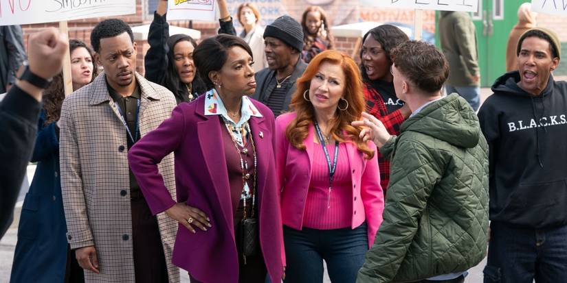Melissa, Barbara, and Gregory confront a crowd in Abbott Elementary.
