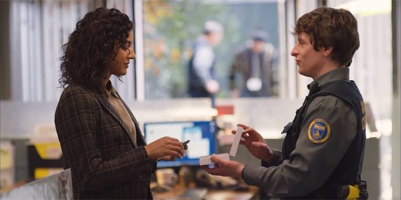 Shred presenting Emily with a gift in Animal Control