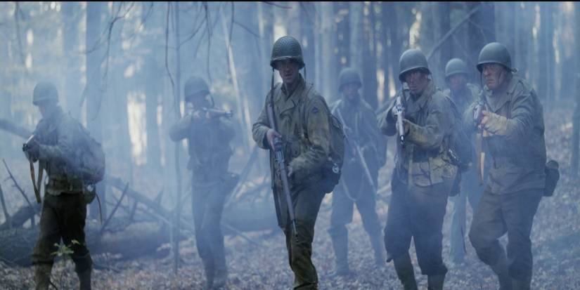 A group of soldiers holding guns in the forest in Assault-on-Hill-400