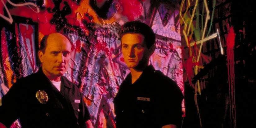 Sean Penn and Robert Duvall behind a grafitti wall in Colors.