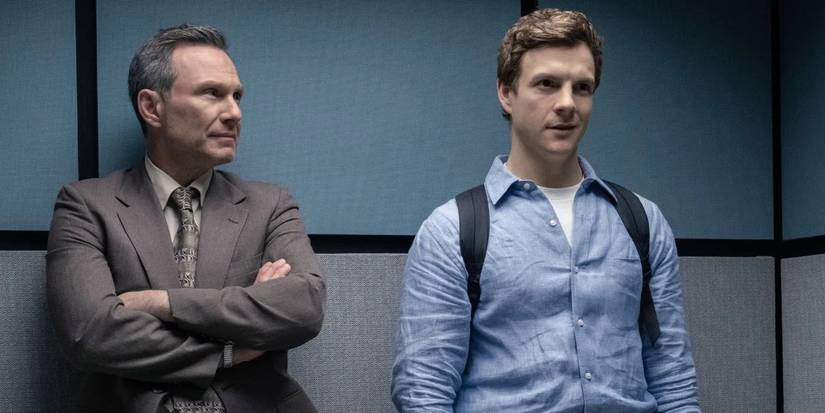 Dexter and Harry Morgan standing in an elevator at Miami Metro in Dexter: Original Sin