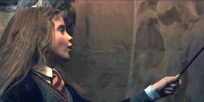 Hermione, played by Emma Watson, performing Alohomora in Harry Potter and the Sorcerer's Stone.