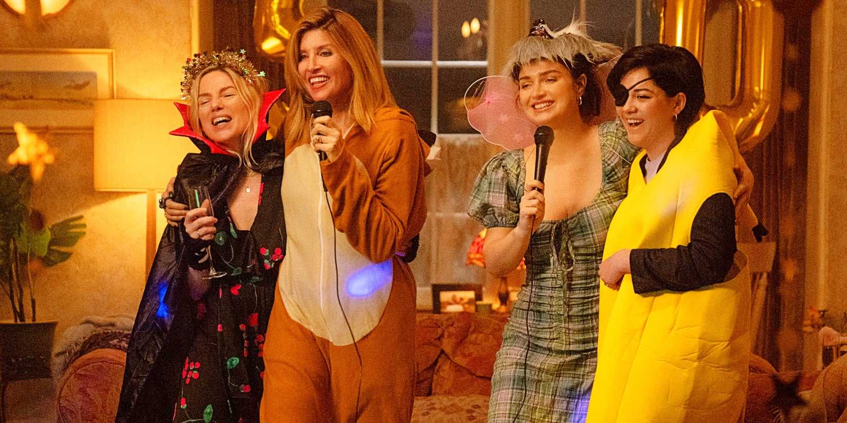 Ursula, Eva, Becka, and Bibi singing karaoke in costumes in Bad Sisters Season 2.