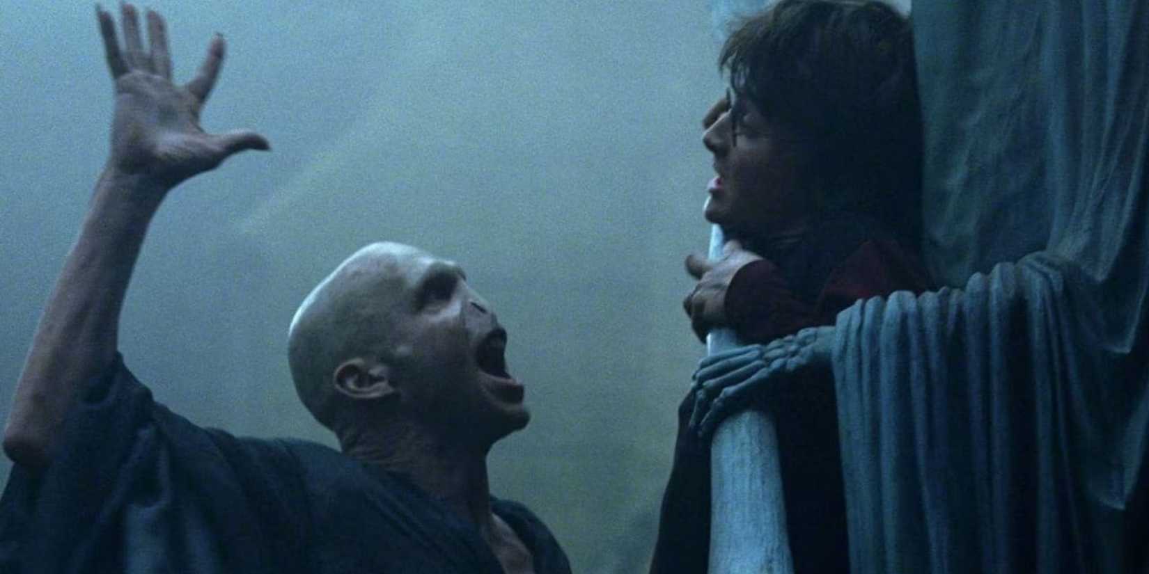 Voldemort about to touch Harry's forehead in Harry Potter and the Goblet of Fire 