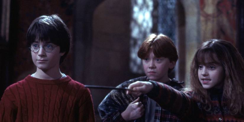 Emma Watson as Hermione with her wand performs Petrificus Totalus in Harry Potter and the Sorcerer's Stone