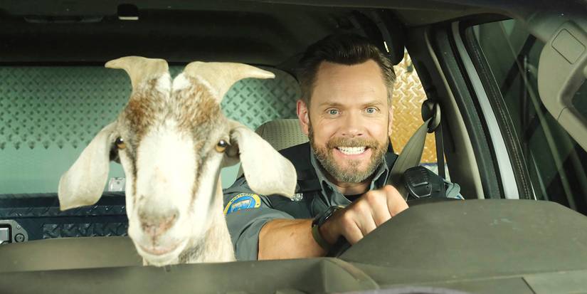 Joel McHale in a car with a goat in Animal Control Season 3 Episode 3