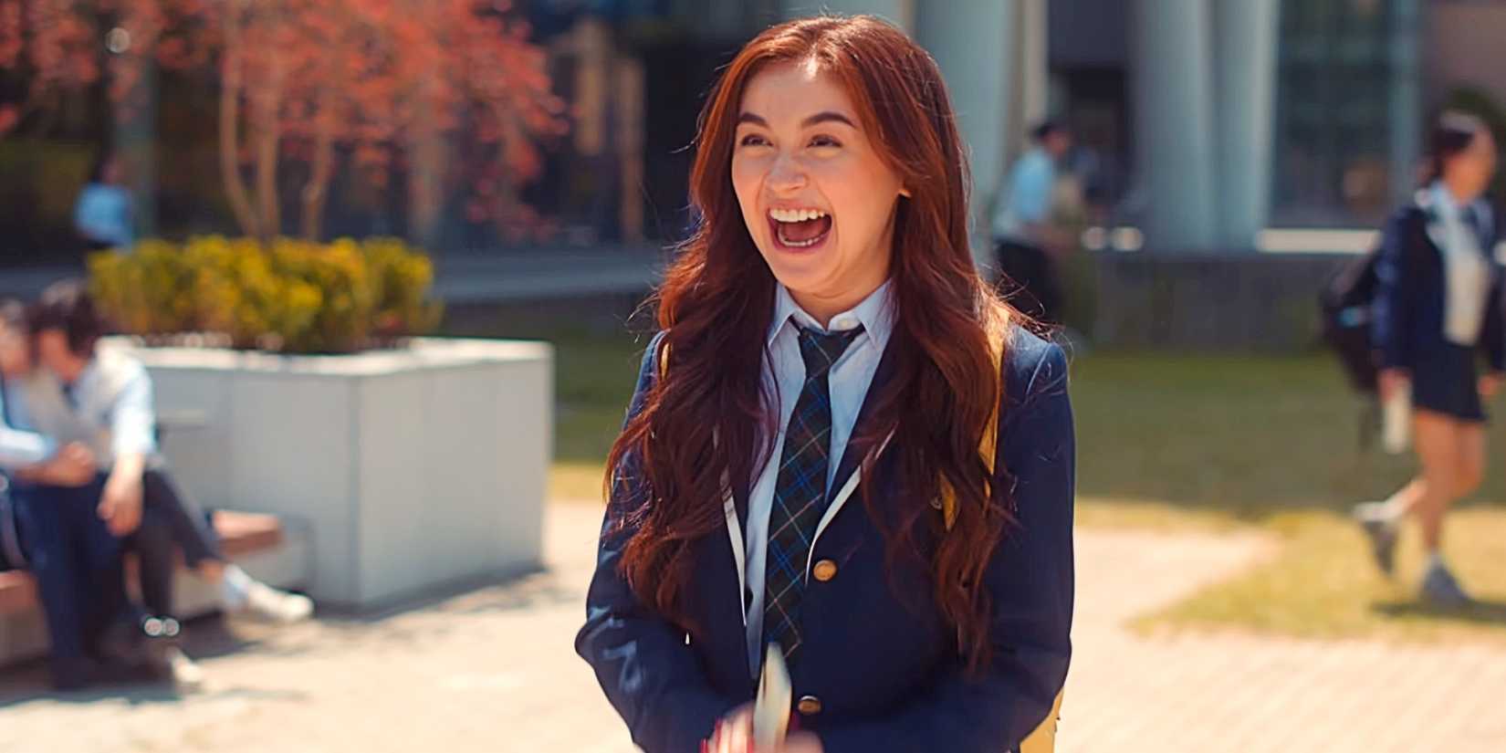Kitty Song Covey smiling and laughing in the Season 2 finale of XO, Kitty.