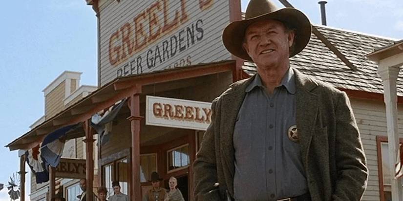 Little Bill Daggett (Gene Hackman) stands in the streets of town in 'Unforgiven'.
