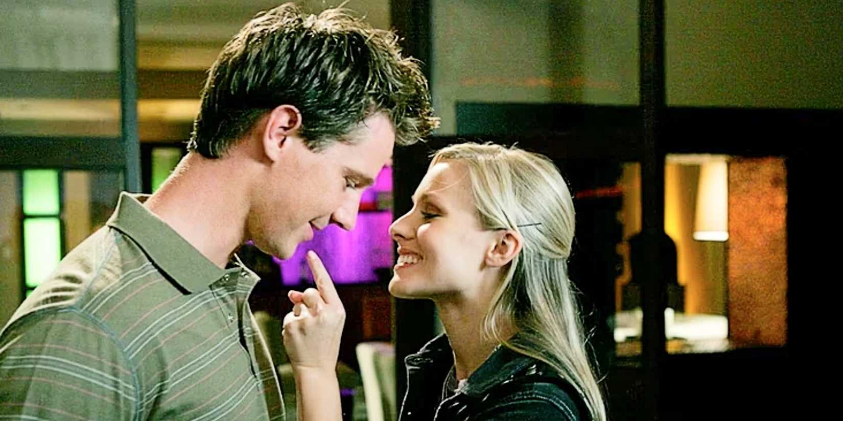Logan Echolls and Veronica Mars smiling at each other in Veronica Mars