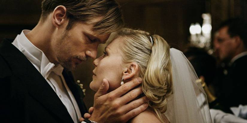 Alexander Skarsgārd and Kirsten Dunst about to kiss at their wedding reception in Melancholia