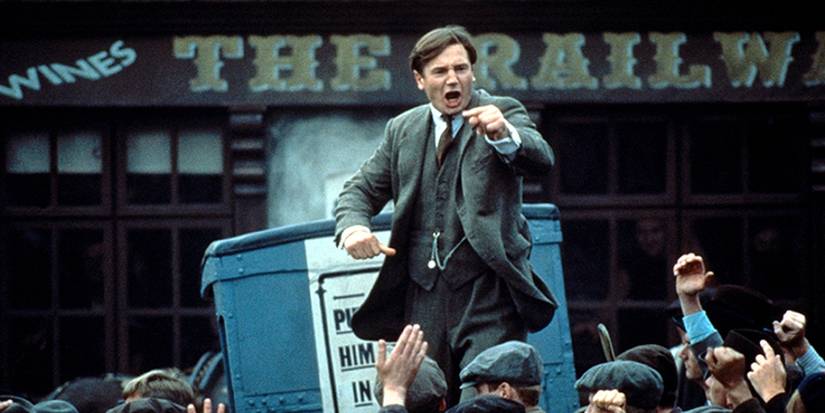 Michael Collins (Liam Neeson) leading a crowd in 'Michael Collins'