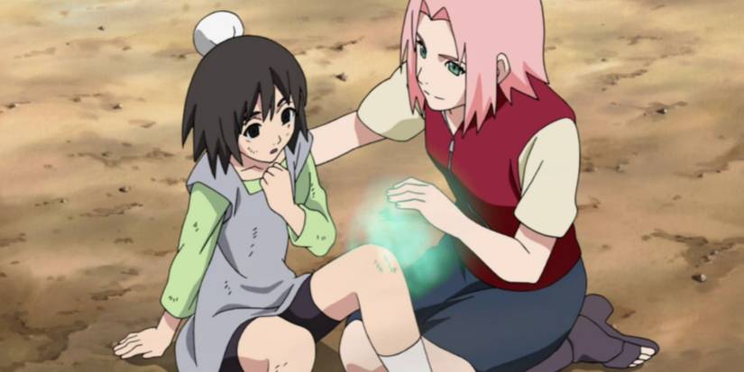 Sakura healing a girls knee in Naruto anime.