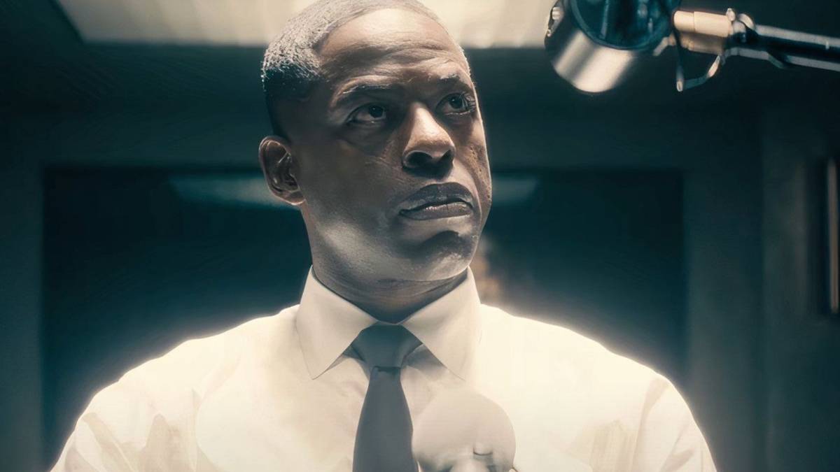 Xavier Collins (Sterling K. Brown) sitting and staring offscreen to the right in Paradise