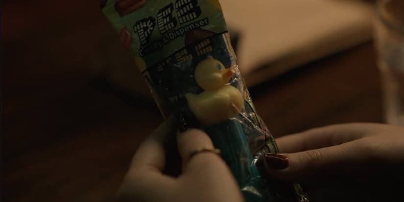 Helen (Jessica Henwick) holds a PEZ dispenser in 'Silo' Season 2