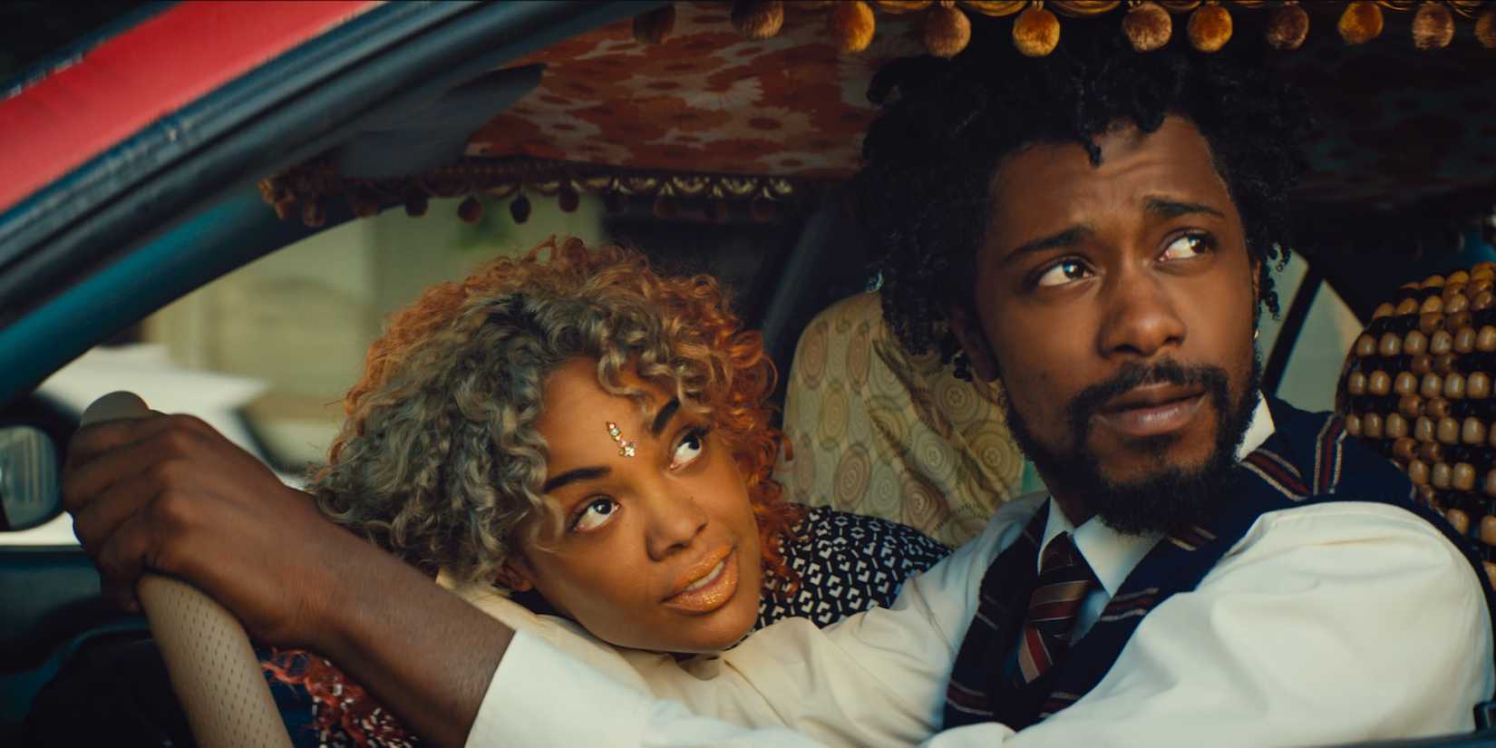LaKeith Stanfield and Tessa Thompson in Sorry to Bother You