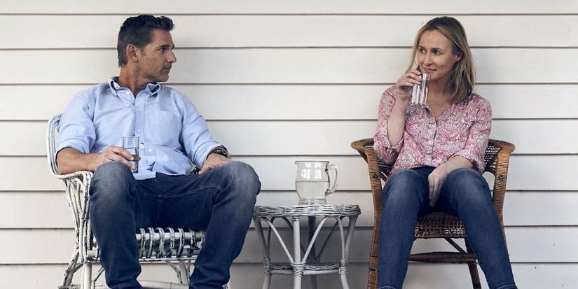 Eric Bana and Genevieve O'Reilly sitting together in The Dry