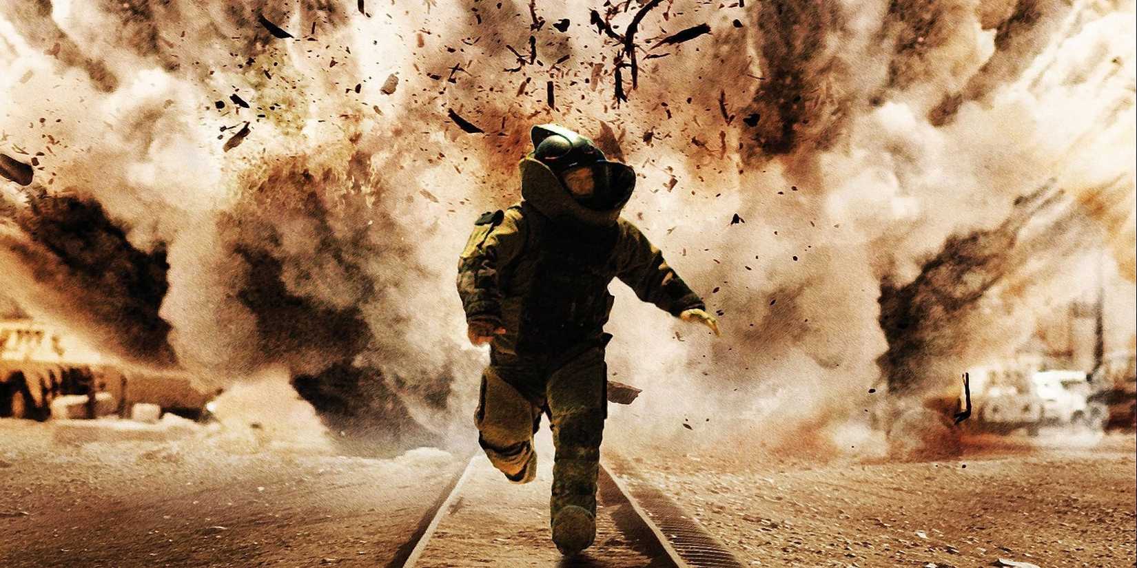 A soldier running from an explosion in The Hurt Locker 