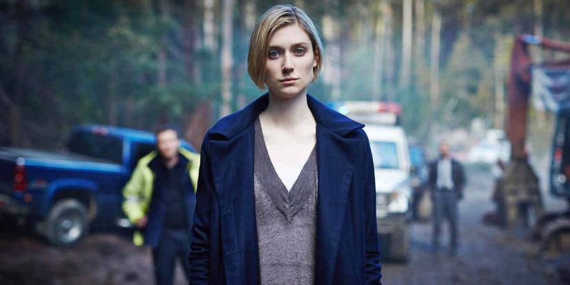 Elizabeth Debicki as Anna Macy staring into the camera with a blank look in The Kettering Incident. 