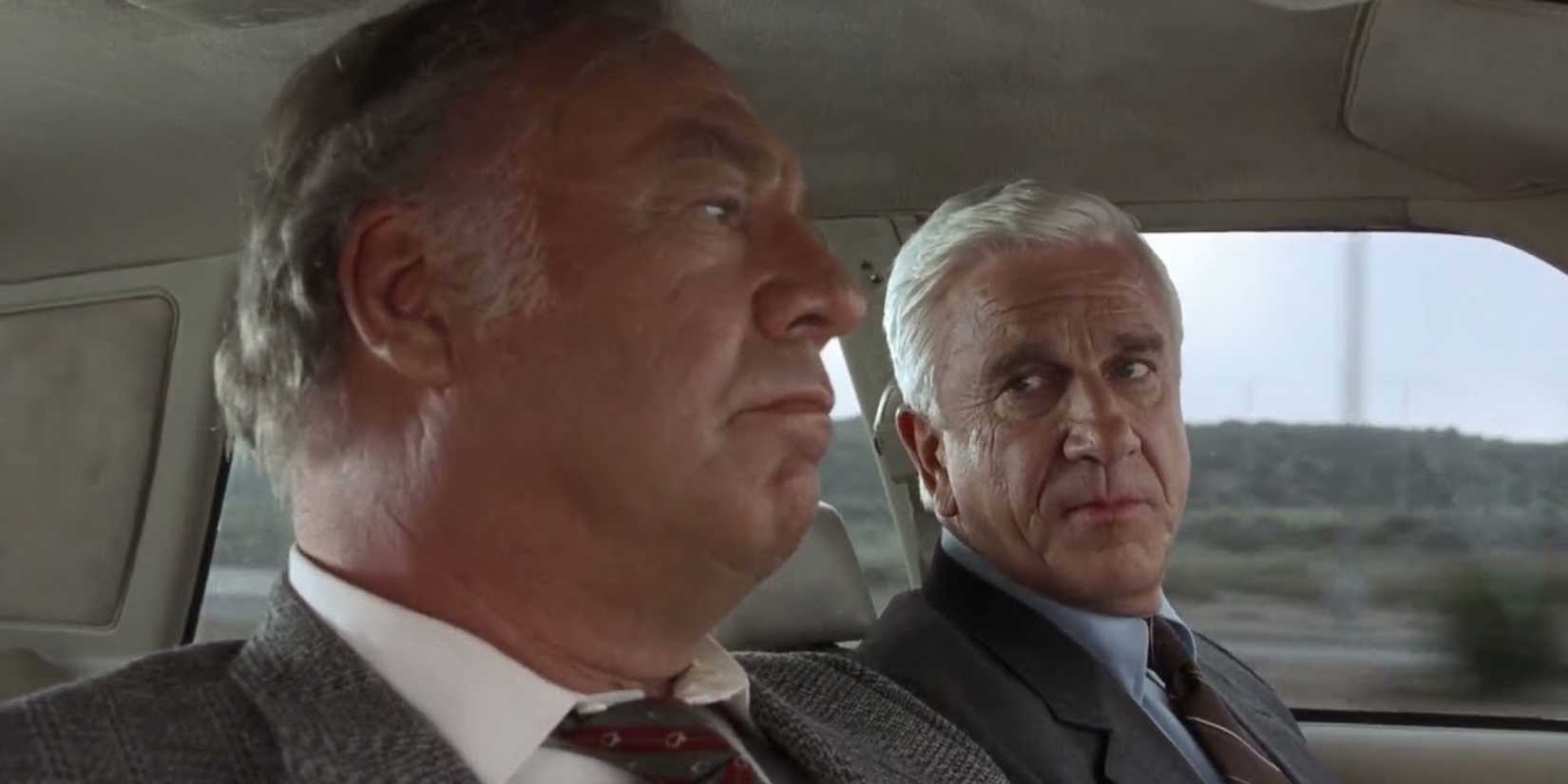 Leslie Nielsen and George Kennedy in 'The Naked Gun'