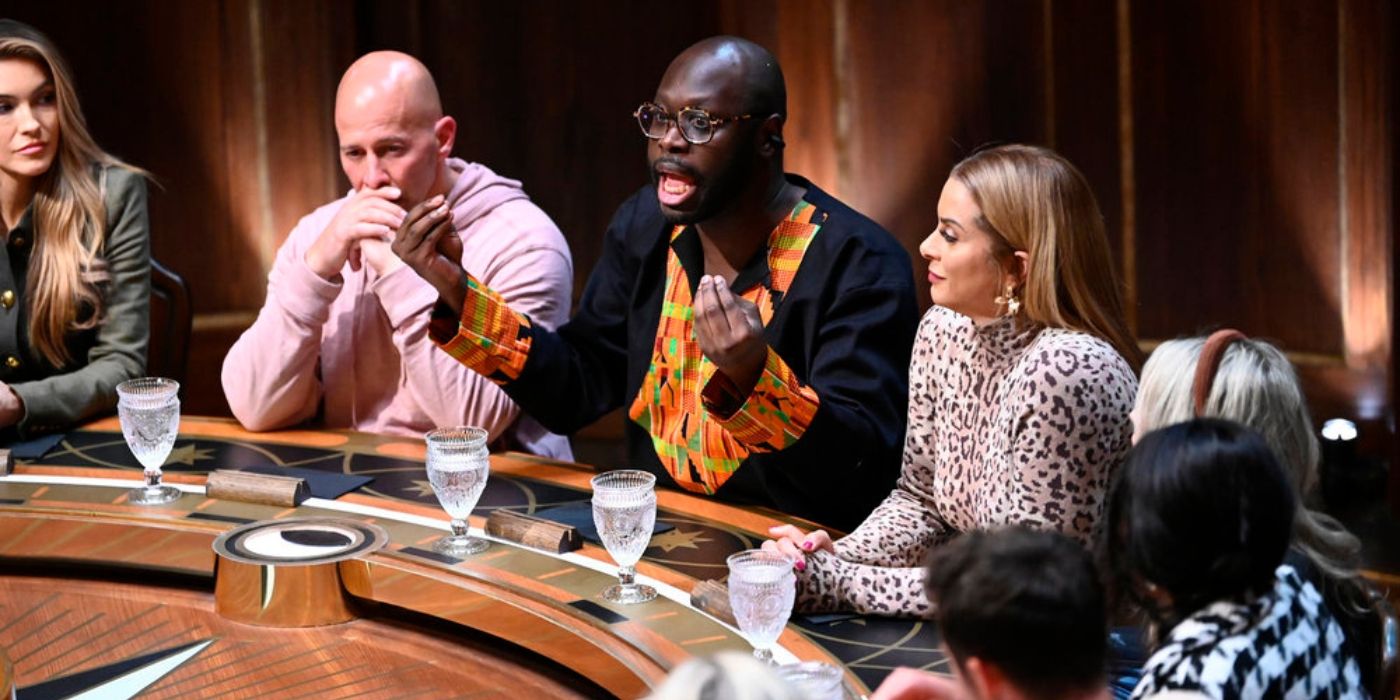 Bob the Drag Queen goes off as Tony Vlachos and Robyn Dixon listen at the Roundtable on 'The Traitors'