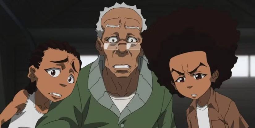 Karakter Riley, Kakek, dan Huey Freeman berkumpul dan terlihat khawatir di The Boondocks. 