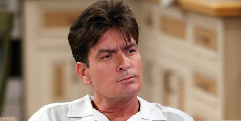 A close up of Charlie Sheen thinking in Two and a Half Men.