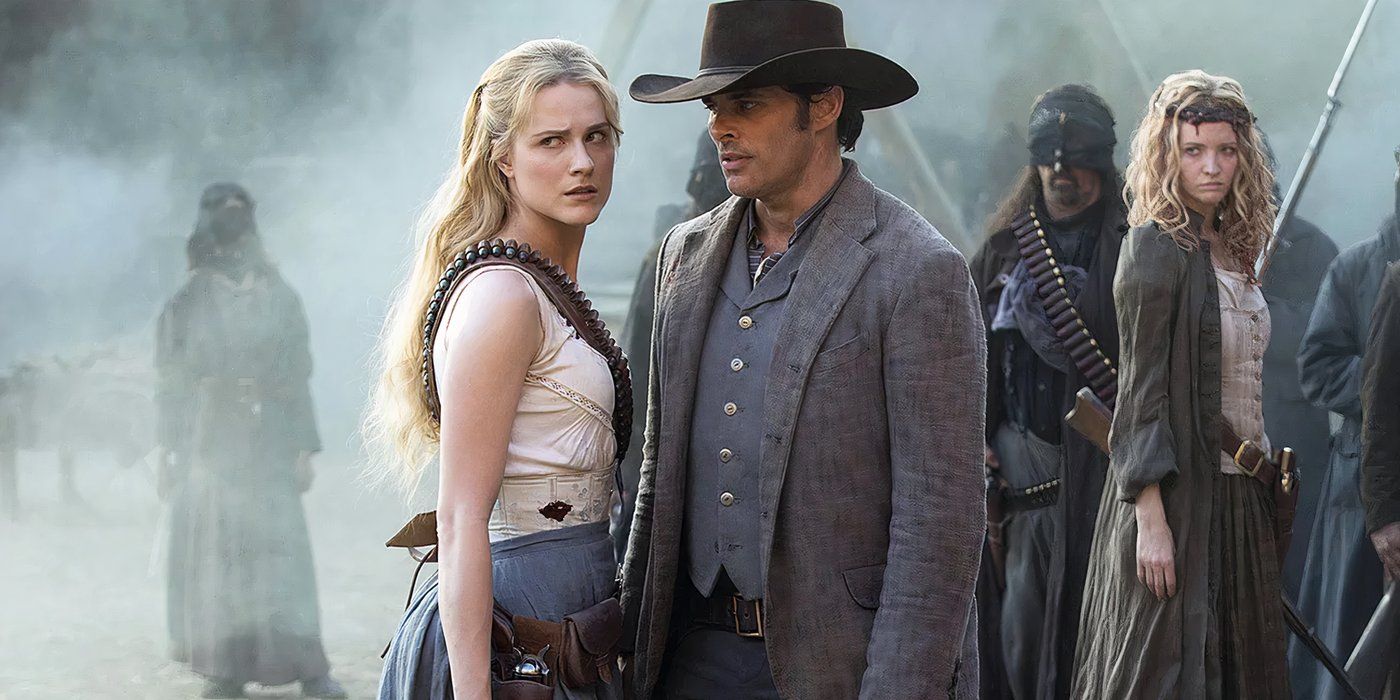 The cast of Westworld stand in a smokey field wearing weapons and looking serious in Westworld season 2.