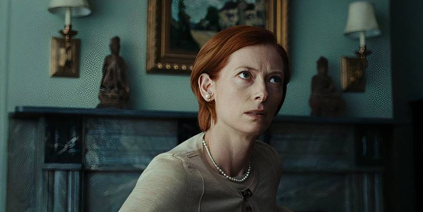 'Burn After Reading' (2008) - Tilda Swinton looks up from her desk concerned