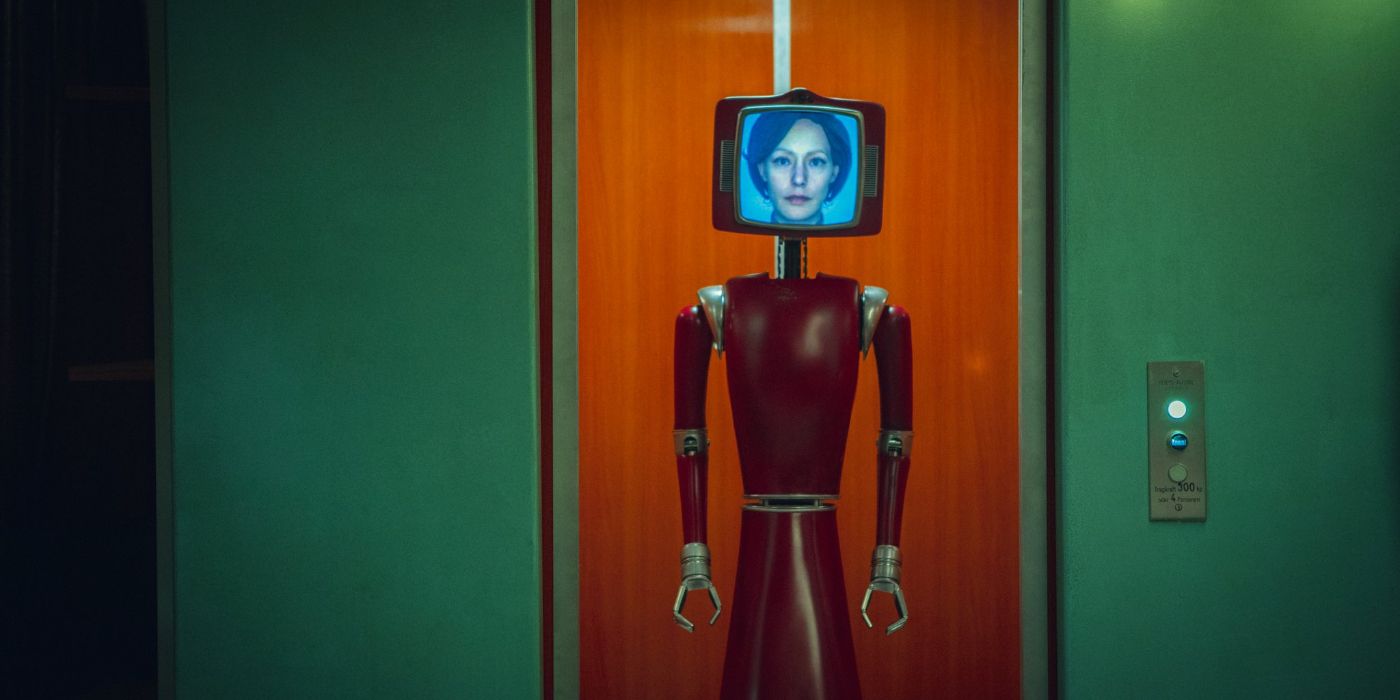cassandra-the-robot-standing-in-an-open-doorway Netflix’s 6-Part Sci-Fi Series Is the Smartest Horror Show Since ‘Haunting of Hill House’