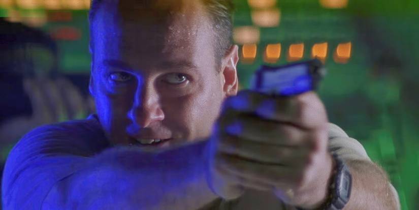 James Gandolfini's Bobby pointing a gun in Crimson Tide