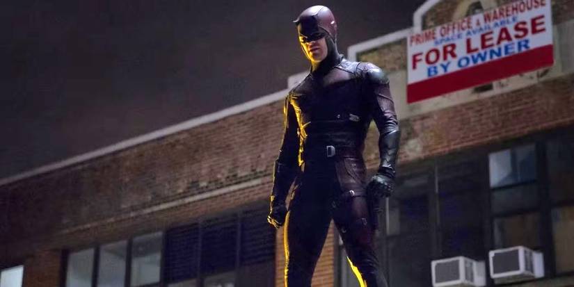 Daredevil standing on a truck looking down in Daredevil Season 1, Episode 13.