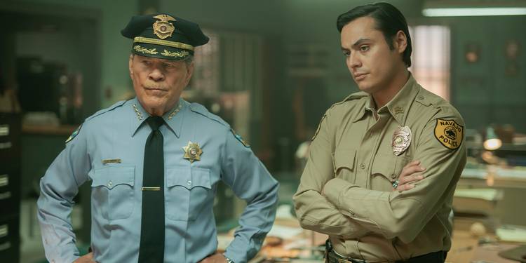 Sheriff Gordo (A Martinez) stands beside Jim Chee (Kiowa Gordon) in the station on 'Dark Winds.'