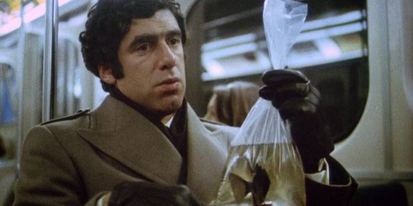 Elliott Gould (Miles) seated on the bus, holding a fish in a plastic bag in The Silent Partner