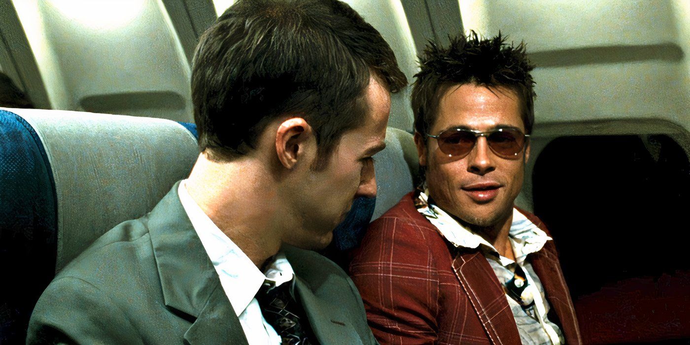 Edward Norton as The Narrator and Brad Pitt as Tyler Durden sitting inside a plane in Fight Club 